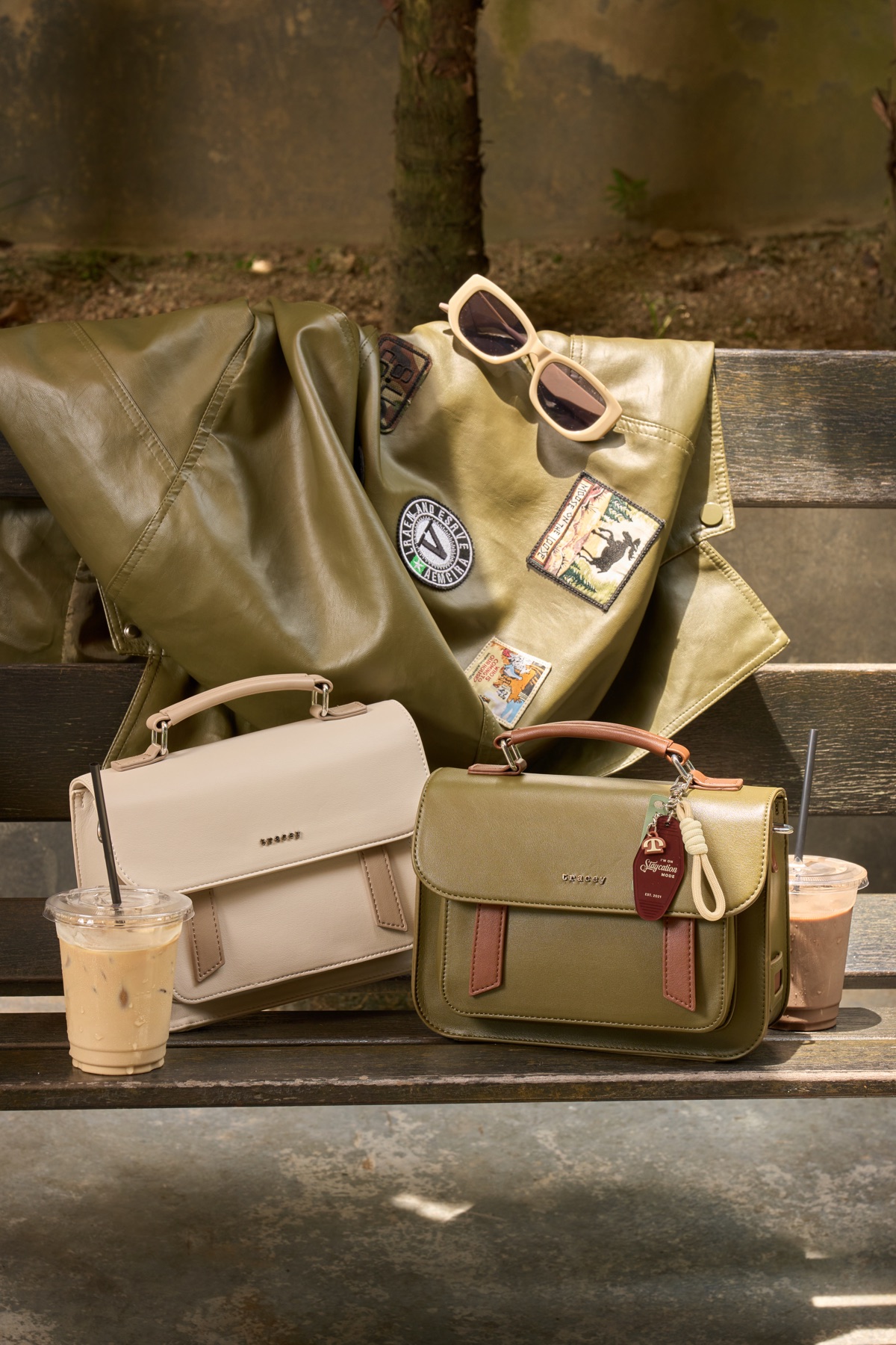 Styled handbag product scene in warm outdoor light